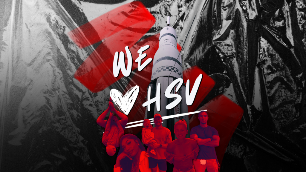 Current image: Huntsville residents in front of the Saturn V rocket with text overlay reading "We heart HSV"